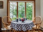 Adjacent to the kitchen is a cozy breakfast nook